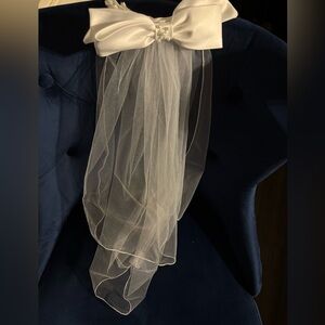 White Bow with pearl headpiece and veil
